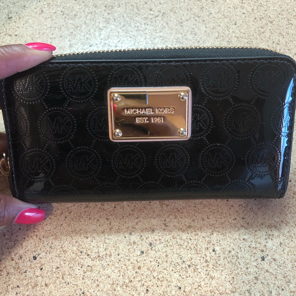 Micheal Kors embossed wristlet